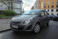 Opel Corsa 1,2 16V Enjoy Benzin modelår 2014 km 83000 Brun