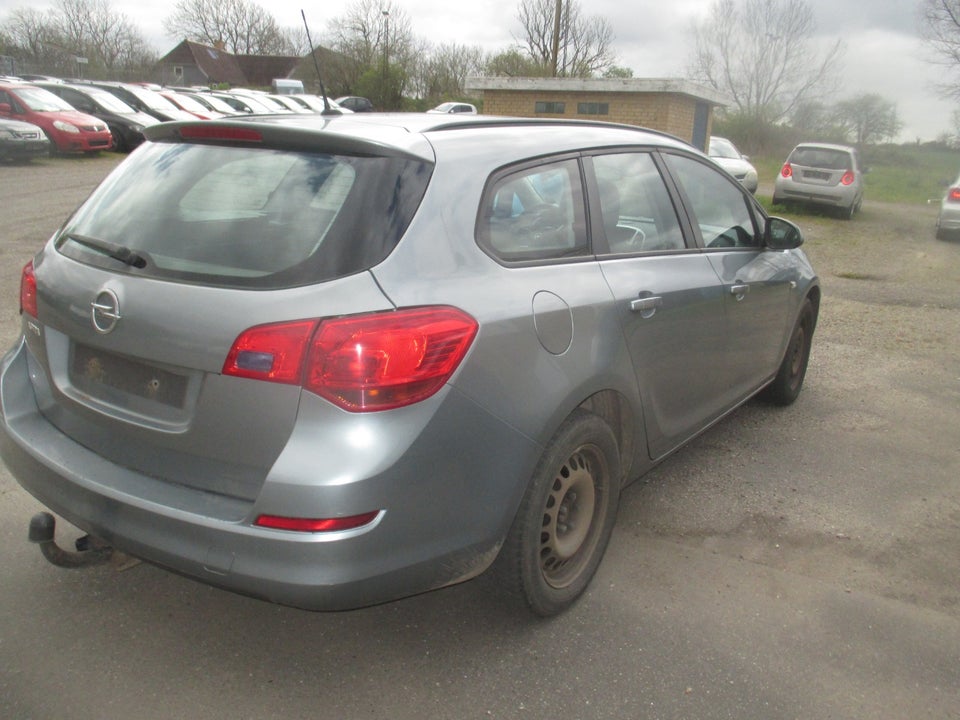 Opel Astra 1,6 Enjoy Sports Tourer Benzin modelår 2011 km