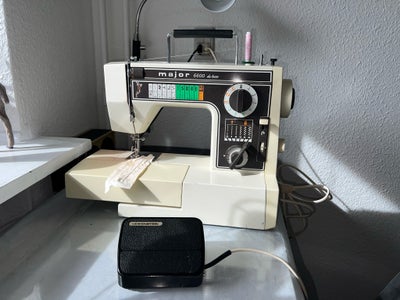 Symaskine, Major 6600 Delux, Den er rigtig god symaskine syr forskellige stof og har god funktioner 
