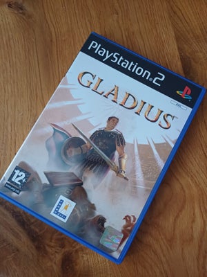 Gladius, PS2, Gladius (Playstation 2 PS2) - Game
Rigtig pæn. Med manual. Uden ridser.