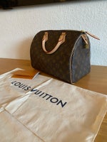 Anden taske, Louis Vuitton