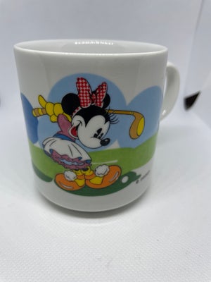 Porcelæn, Krus, Disney krus, med Minnie, der spiller golf. Det er i fin stand. Pris 30 kr, plus evt 