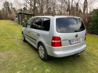 VW Touran, 1,6 FSi Trendline DSG, Benzin