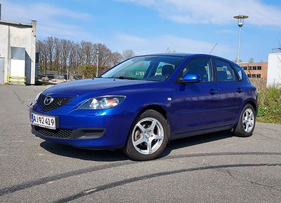 Mazda 3, 1,6 Comfort, Benzin, 2007, km 147000, blåmetal, klimaanlæg, ABS, airbag, alarm, 5-dørs, cen