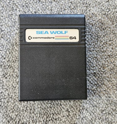 Sea Wolf, Commodore 64, Cartridge spil til C64 fra Commodore kaldet Sea Wolf.
Virker som det skal.
