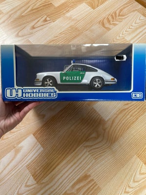 Modelbil, Universal hobby porsche 911 2.4l german "polizei" 
Kan sendes og afhentes! 