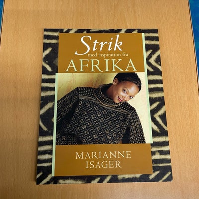 Strik med inspiration fra Afrika, Marianne Isager, emne: håndarbejde, 2007, 135 sider. Opskrifter på