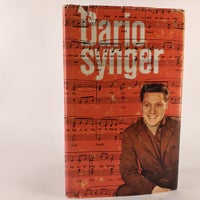Dario synger, Niels Skouboe