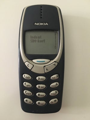 Nokia 3310, Rimelig, Nokia 3310.
Oplader medfølger.
Der er ridsede tal ind i plastikken på bagcovere