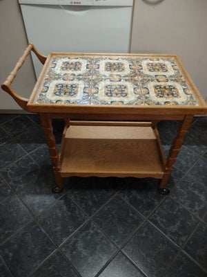 Serveringsbord / rullebord, 1 stk brugt rullebord / serveringsbord i egetræ med kakler. L:65cm. D:45