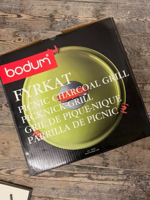 Anden grill, Bodum, Helt ny, uåbnet picnic grill fra Bodum. Modellen Fyrkat. Farven er gul. Nypris 8