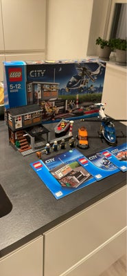 Lego City, 60009, Lego City
Nr. 60009
Politi helikopter, hus, båd og bil. 
Alle dele medfølger + byg