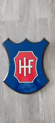 Emblemer, Hvidovre IF - Skjold emblem, 30cm lang gange 25cm bred.
HIF-merchandise, fan-skilt, HIF-vå