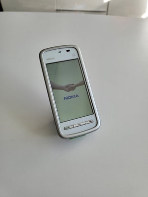 Nokia 5230, Defekt, Højtaler ?? defekt.
Lader medfølger.