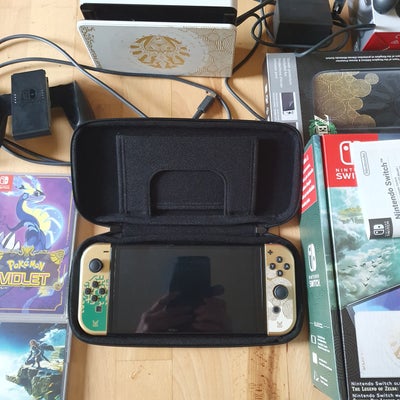 Nintendo Switch, Zelda  version Oled model, Perfekt, Helt som ny, brugt få gange med 6 spil, taske o