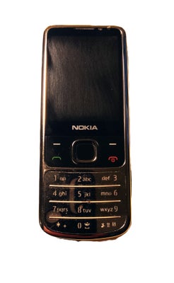 Nokia 6700c-1, krom fra 2009.
Ren vintage – en 15 år gammelt mobil! 
Den var noget af det ypperste m