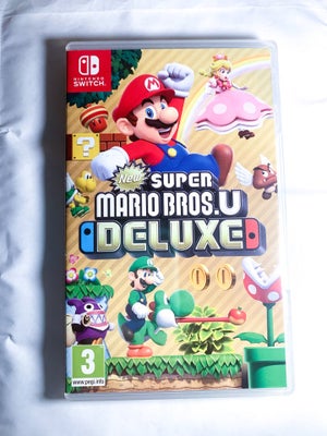 New Super Mario Bros U Deluxe, Nintendo Switch, Spillet er testet og virker uden problemer

Kan send