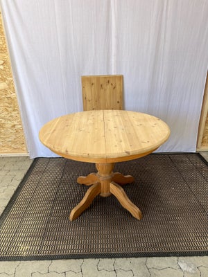 Spisebord, Fyrretræ, b: 110, Rundt spisebord i massiv fyrretræ med en tillægsplade á 50 cm

Bordet e