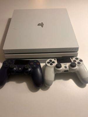 Playstation 4 Pro, God, Der er et par sorte mærker på toppen af Playstation men ellers så du den hel