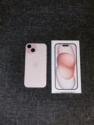iPhone 15, 128 GB, pink, Perfekt, Mere eller mindre ny iPhone 15 i pink sælges. Den har 128 gb. Den 