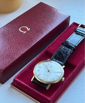 Herreur, Omega, Et pragteksemplar af det klassiske vintage Omega Seamaster De Ville i 14 kt. guld på