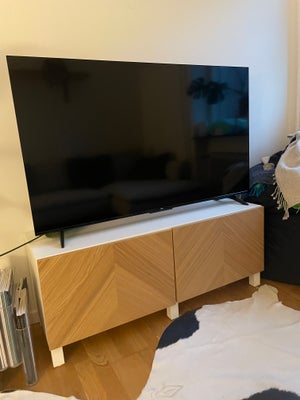 Tv bord, b: 120 l: 40 h: 48, Lækkert tv-bord fra Ikea, med egetræsfiner låger. 

Umiddelbart ingen r