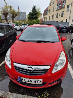 Opel Corsa, 1,0 12V Enjoy, Benzin, 2008, km 215000, rød, 3-dørs, Den har kørt 215.000km 
Den starter