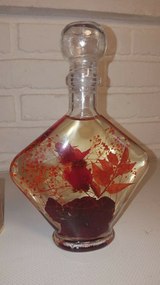 Blomtserdekoration i flaske
