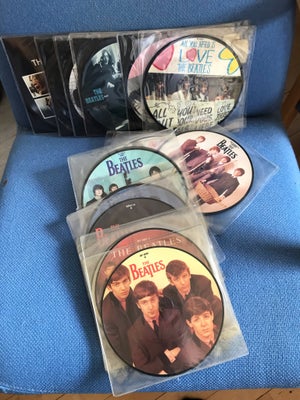 Single, The Beatles, Rock, 22 picture disc singler fra Love Me Do til Let It Be.
Perfekt stand 
Fast