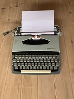 Fine lille skrivemaskine. Ved ikke så meget om...