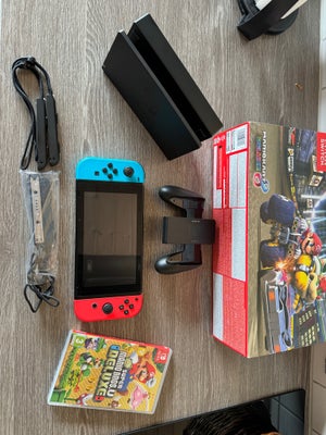 Nintendo Switch, Perfekt, Ca 1 år gammel Nintendo Switch med Super Mario spil. Har maksimalt været b