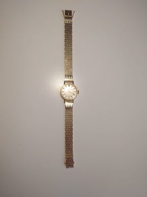 Dameur, Omega, Dame ur Omega Geneve Antik fra 1962erne
14 karat guld hele uret er ægte guld både inf