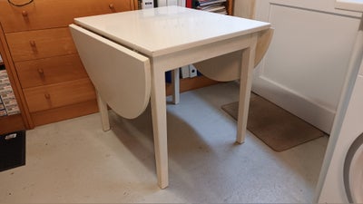 Spisebord, træ, b: 80 l: 70, fint lille hvidt bord med 2 plader
kan blive ca 15o cm langt med de 2 p