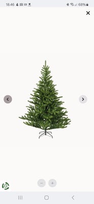 Kunstig juletræ, Dette juletræ er pænt og naturtro. H 180cm. Ø 148cm.
Mærke Everlands Liberty Spruce