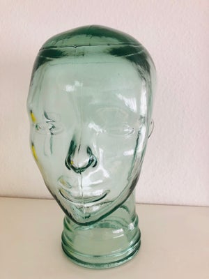 Glas, Hoved, Glashoved i klar glas.
Måler : 29 cm. i højden.
Måler : 17 cm. i bredden.
Kan f.eks. br