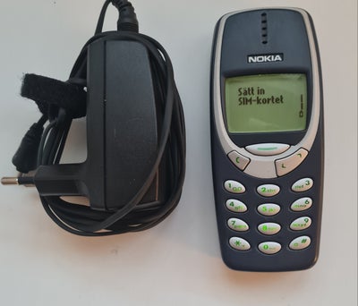 Nokia 3310, God, Bagcoveret har lidt skrammer.. virker 100% og inkl oplader..