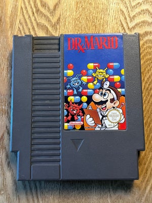 Dr. Mario, NES, Kun spil - der er ingen æske eller manual med.

Køber betaler fragt ved forsendelse.