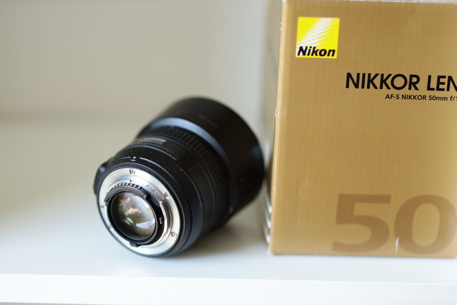 Canon, Nikon 50 1.4G, God