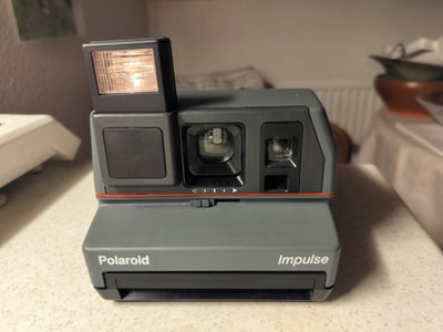 Polaroid, Impulse, God, Instant kamera i rigtig god, testet og fejlfri stand.
Blitz skyder og ruller