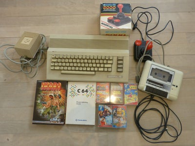 Commodore 64, spillekonsol, ældre spillemaskine.

Joystick
Båndoptager
Spil
Manual
Nødvendige kabler