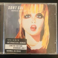 Sort sol : Unspoiled Monsters (CD), rock