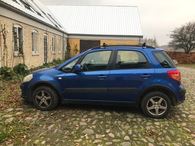 Suzuki SX4, 1,5 GL, Benzin, 2006, km 266000, blå, træk, nysynet, klimaanlæg, aircondition, ABS, airb