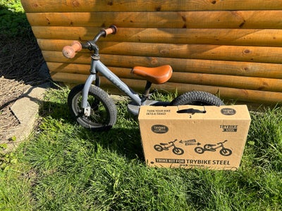Unisex børnecykel, løbecykel, Fin løbecykel som kan laves om til en trehjulet. Stellet har aldrig væ