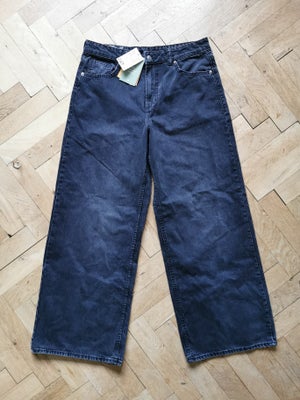 Jeans, H&M, str. 42,  Sort,  Ubrugt, NYE, sorte jeans / cowboybukser. Str. 42.
Relaxed. Regular wais