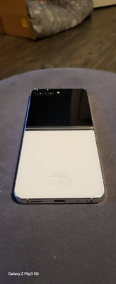 Samsung Z Flip 5, 256 GB , Perfekt, Perfekt Samsung Z Flip 5 sælges.

Den er hvid/sølv og sort.

256