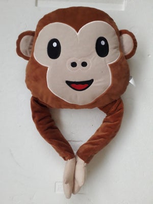 pude, Sjov pude formet som abe. Den har velcro på håndfladerne, så den kan holde sig selv i hånden o