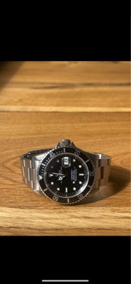 Herreur, Rolex, Rolex Submariner 16610. 
Årgang 1995. Watch only, dog følger kvittering med 

Tikker