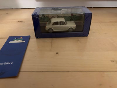 Modelbil, Tintin, skala 1:43, Helt ny Tintin bil med certifikat.
Folien har nogle huller, som ses på