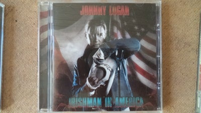 Johnny Logan ** Irishman In America               : ., pop, 
Velholdt original CD med intakt cover s