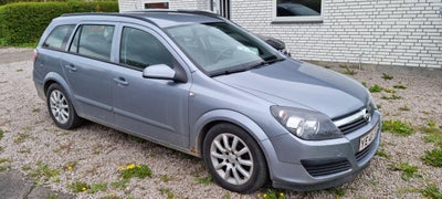 Opel Astra, 1,6 16V Enjoy Wagon, Benzin, 2006, km 272000, lysblåmetal, træk, aircondition, ABS, airb